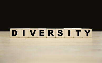 Diversity word written on wooden blocks. Diversity text for your desing, concept.