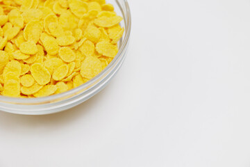 Top view of part of bowl with corn flakes with copy space