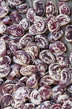 Close up of beautiful heirloom beans on kitchen cutting board