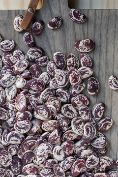 Heirloom beans on kitchen cutting board