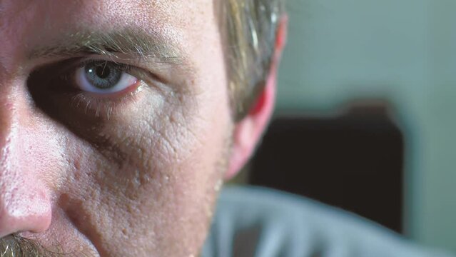 Close-Up of a Serious Adult Man's Half-Face
