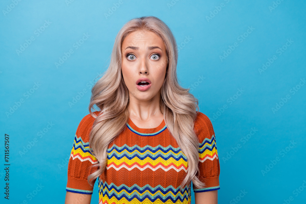 Poster photo of shocked funky lady wear print shirt big eyes open mouth isolated blue color background