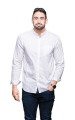 Fototapeta premium Young business man over isolated background puffing cheeks with funny face. Mouth inflated with air, crazy expression.
