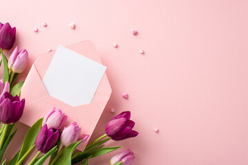 Cherish Moments: top view delightful Spring tableau unfolds with open envelope, dainty hearts, fresh tulips on pastel pink. Versatile backdrop for expressions of love or promo content. Space for text - obrazy, fototapety, plakaty