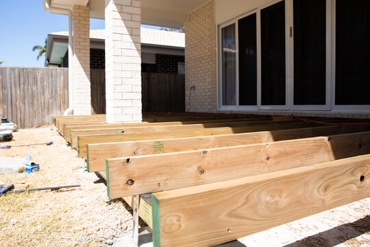 a new deck and a new house under construction