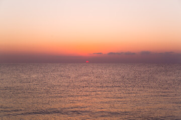 Fototapeta premium Orange sunrise over the sea, beautiful landscape ocean.