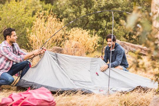group of guys camping in the woods