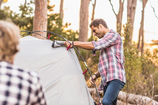 group of guys camping in the woods