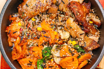 top view Korean chicken bibimbap at horizontal composition