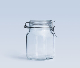 Empty clip-top glass jar isolated