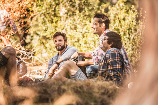 Group of guys hiking in the woods