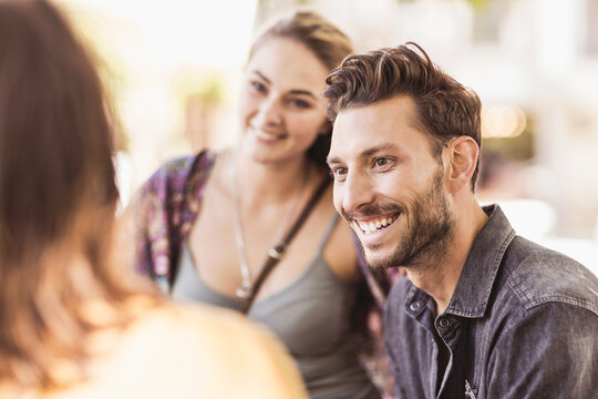 Romantic couple having a happy time at an outdoor restaurant.