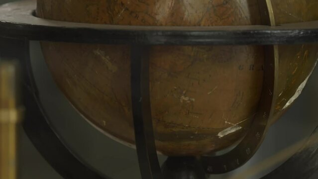 Old Wooden Globe in Geography Study Display