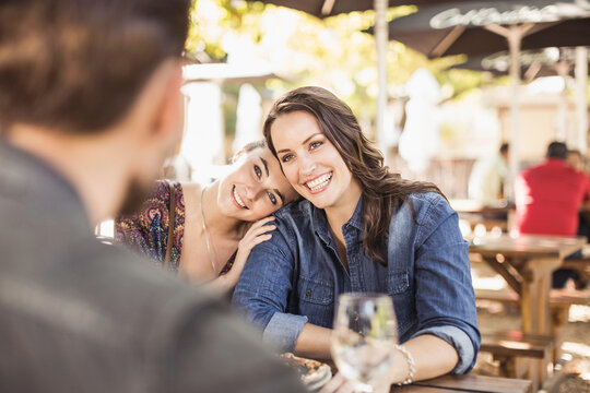 Romantic couple having a happy time at an outdoor restaurant.