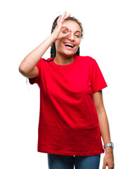 Young braided hair african american girl over isolated background doing ok gesture with hand smiling, eye looking through fingers with happy face.