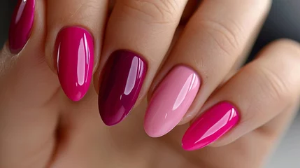 Fotobehang Elegant woman s hand with deep berry and plum nail polish, gel manicure at a luxury beauty salon © Ilja