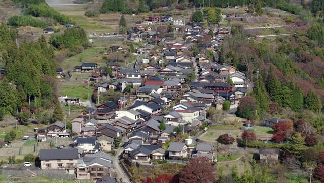 Aerial view of Magome, aka Magome-juku, during autumn season in Japan. Magome is a former post town on the Nakasendo trail, a major route that connected Tokyo with Kyoto in the feudal ages.