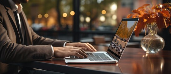 Man's hand using smartphone, laptop on office desk. Office company business info hand - obrazy, fototapety, plakaty