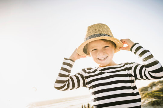 Young boy having fun playing on the beach