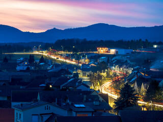 village of lackendorf in Burgenland at sunset with light trails from trafic