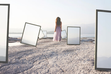 woman walking towards infinity crossing a street with surreal windows to the sky, abstract concept