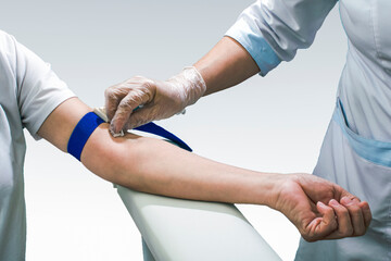Nursing procedure of withdrawing blood for blood test.