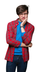 Young handsome student man wearing glasses over isolated background thinking looking tired and bored with depression problems with crossed arms.