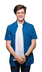 Young handsome man wearing glasses over isolated background with a happy and cool smile on face. Lucky person.