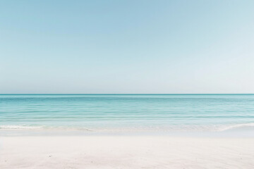 Fototapeta na wymiar Serene beach scene with clear blue sky and calm sea