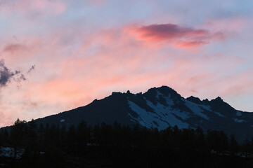 Sunset in the mountains of Siberia. Western Sayan mountains