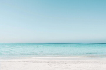 Fototapeta na wymiar Serene beach with calm turquoise waters and clear skies