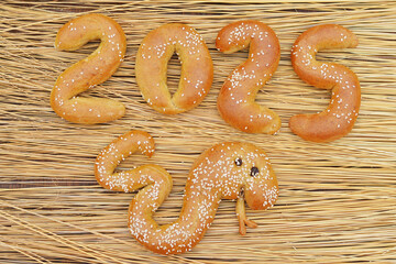 Buns in the shape of 2025 and a snake.