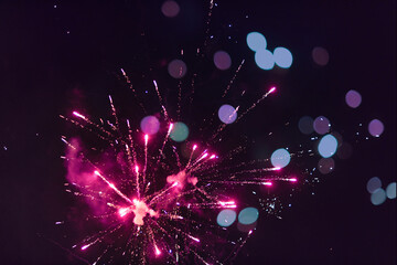 Fototapeta na wymiar festive salute and fireworks on a dark sky background,
