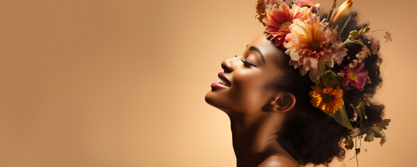 A young smiling African-American woman with flowers in her hair on a beige background. A banner...
