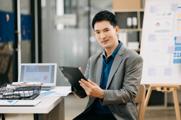 Modern business Asian man in the modern office with copy space.