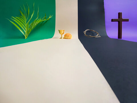 Holy Week, Lent Season, Palm Sunday, Maundy Thursday, Good Friday, Easter Sunday Concept - palm leaf,chalice and bread,crown of thorns and wooden cross with green, white, black and purple background.