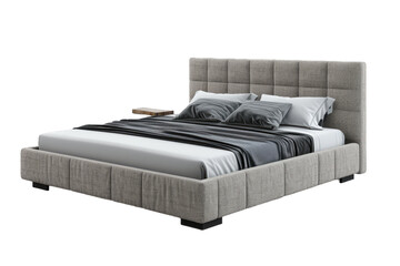 Bed With Gray Headboard and Pillows