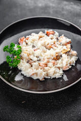 risotto seafood rice fresh delicious eating cooking appetizer meal food snack on the table copy space food background rustic top view