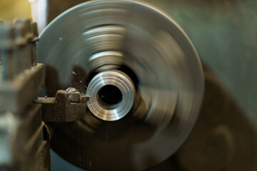 Close up shoot showing a drilling - lathing machine in operating.