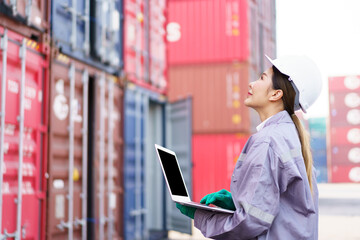 Senior female custom clearance officer checking the imported cargo at container yard.