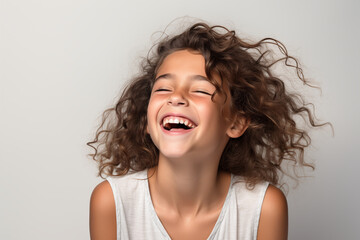 Laughing girl on a white background.