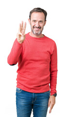 Handsome middle age hoary senior man wearing winter sweater over isolated background showing and pointing up with fingers number three while smiling confident and happy.