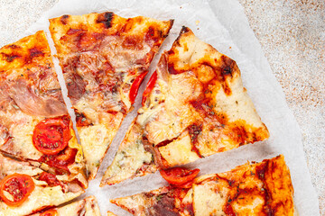 pizza jamon, tomato sauce, cheese fresh eating cooking appetizer meal food snack on the table copy space food background rustic top view