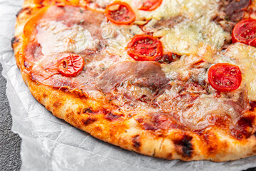 pizza jamon, tomato sauce, cheese fresh eating cooking appetizer meal food snack on the table copy space food background rustic top view