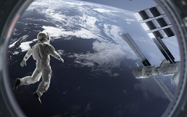3D illustration of astronaut at spacewalk near International space station at Earth orbit. High quality digital space art in 5K - realistic visualization © Vadimsadovski