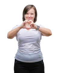Young adult woman with down syndrome over isolated background smiling in love showing heart symbol...
