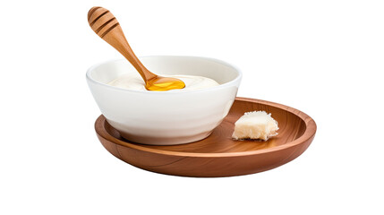 Turkish yogurt with honey in a bowl with wooden honey dipper, isolated