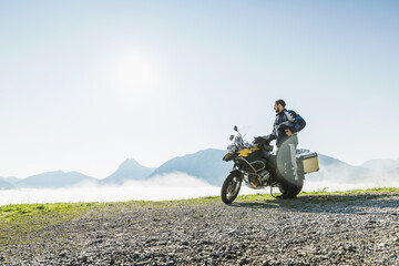 man on a motorcycle in the mountains. Achenkirch, Austria