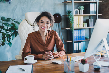 Photo of successful charming lawyer lady sitting leather chair enjoy fresh coffee break modern...