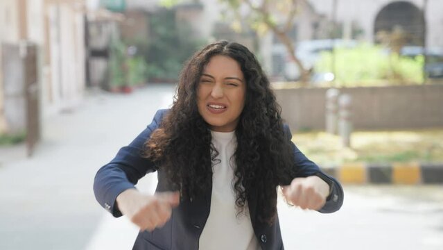 Curly Hair Indian Businesswoman Cheering